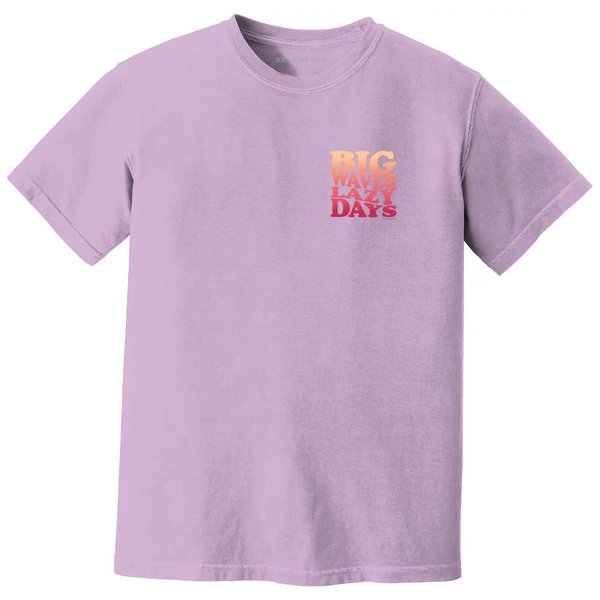 This is the front of the orchid Joe's Surf Shop Big Waves Lazy Days Oversized Tee.